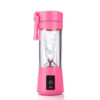 Portable pink electric juicer blender