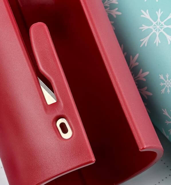 Convenient sliding cutter for gift wrap